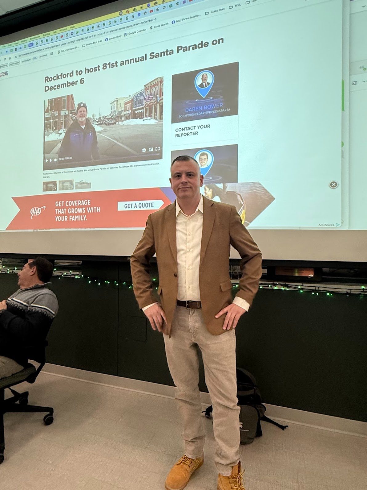 Andrew Gillfillan standing at the front of a Michigan State journalism classroom
