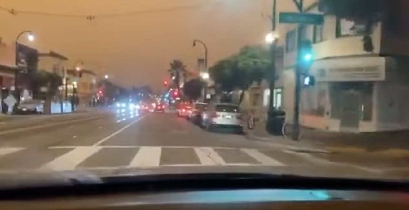 Driving through Andrew Gillfillan’s Bay Area neighborhood beneath a smoke-orange night sky