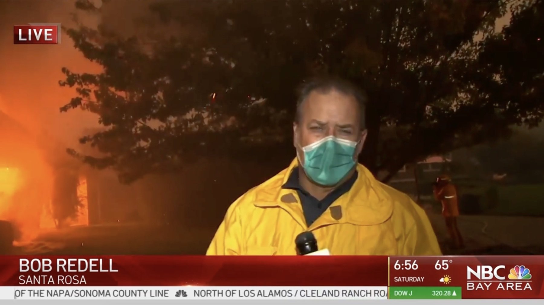 NBC Bay Area reporter Bob Redell reporting live beside a burning home in Santa Rosa