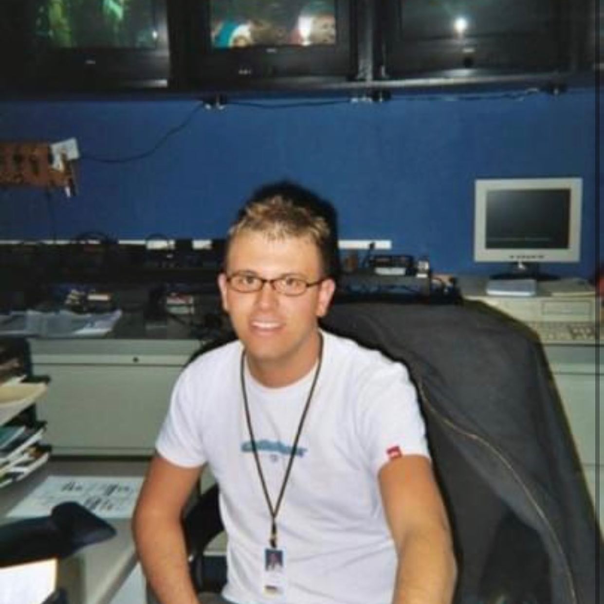 Andrew Gillfillan as an intern at the WOOD TV8 assignment desk in Grand Rapids